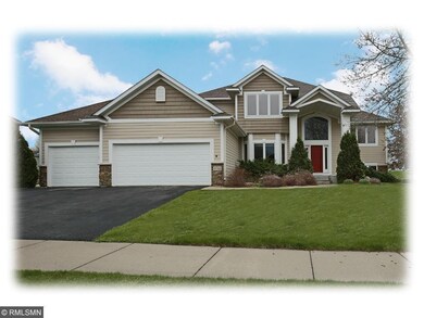 This grand two-story home is nestled on a beautifu