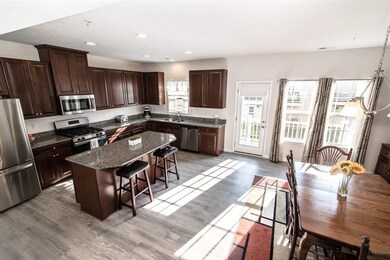 Beautiful kitchen with granite countertops, stainl