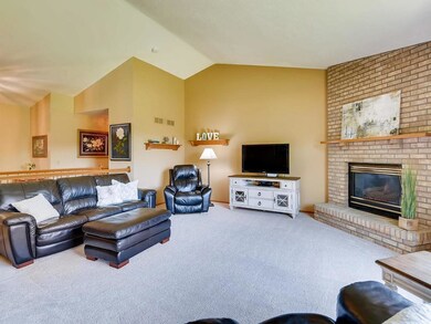 The vaulted and open Living Room adds to the spaci