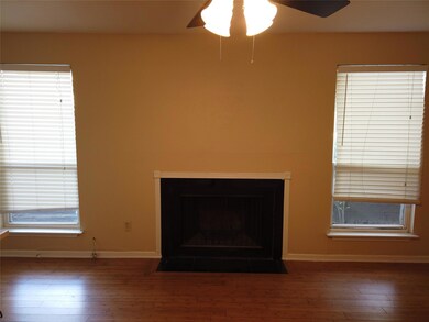 Room details featuring a fireplace with flush hea