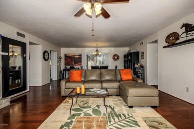 Spacious living room with high ceilings.