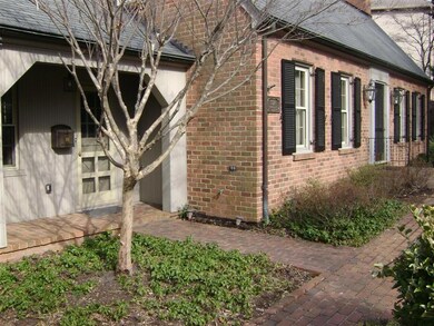 Side Entrance with Brick Walkway