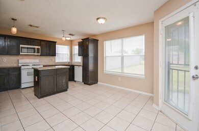 7433 Maxroy St, Houston, TX 77088 - photo 6