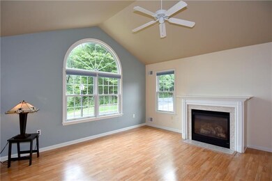 A gas fireplace sits as the centerpiece of the inv