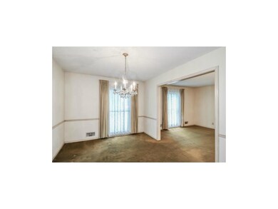 Formal dining room adjacent to kitchen and Living 