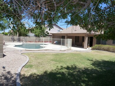 Back yard w/fenced pool