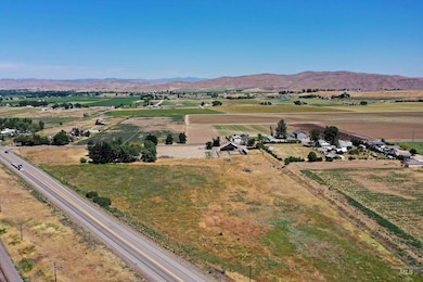 View of rural area with a mountain backdrop