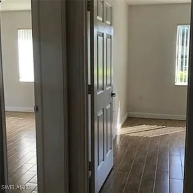 Foyer featuring dark wood-type flooring