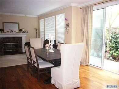 Dining area with laminate floors.