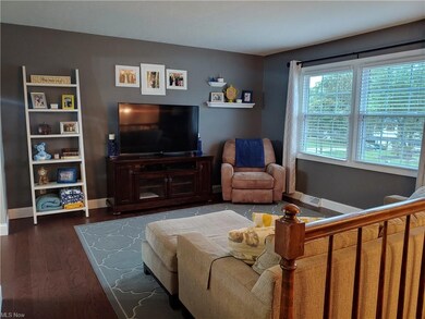 Living Room - newer wood floors, lots of natural l