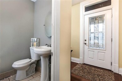 Half bath/Powder room just off the front entrance.