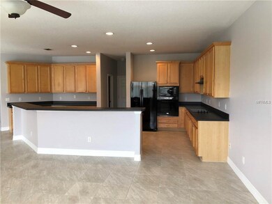 Fresh new tile flooring in the kitchen and family 