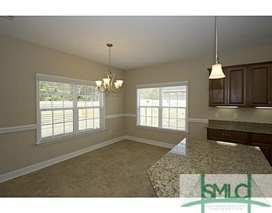 Dining Room. Ceramic tile and chari rail in the di