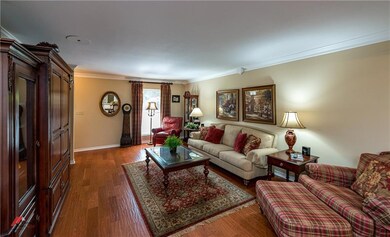 Large living area with beautiful floors.
