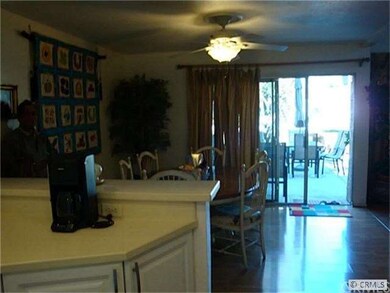 View from kitchen to dining area out to patio.