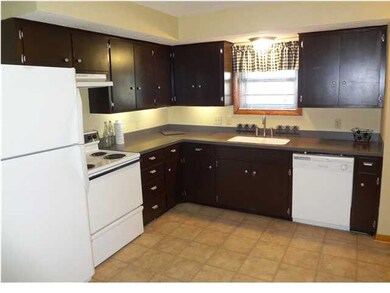 Renewed kitchen with new countertops, sink, dispos