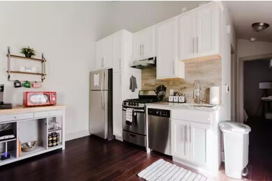 Kitchen with stainless steel appliances, a sink, 