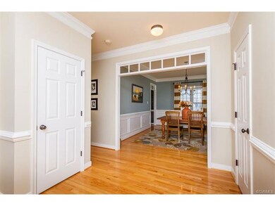 Open foyer with office to the Left and dining room