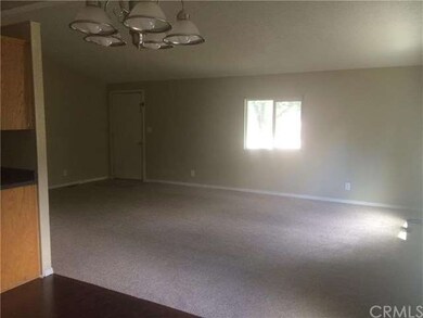 Living room with vaulted ceilings