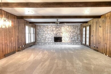Family room with access to the back patio along wi