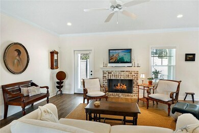 Family room is so inviting with a fire in the fire