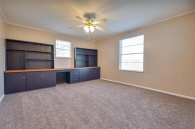 Living Room with Built-in desk, shelves and cabine
