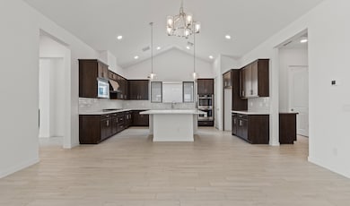 Kitchen with vaulted ceiling