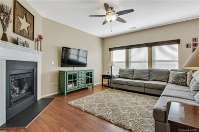 Living area. Laminate flooring throughout main.