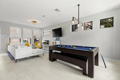 Recreation room featuring billiards and light woo