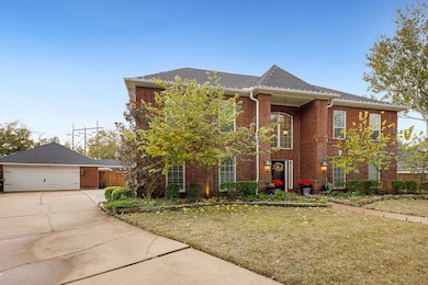 View of front of the home with double wide drivewa