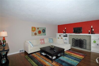 Living Room - New hardwood flooring, fireplace wit