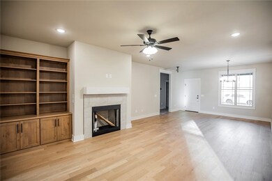 Built in cabinets & gas log fireplace