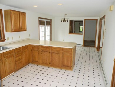 Kitchen overview toward side entry