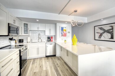 Kitchen featuring light hardwood / wood-style floo