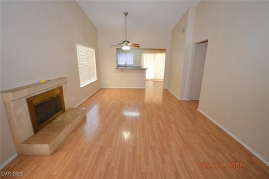 Unfurnished living room with light wood finished f