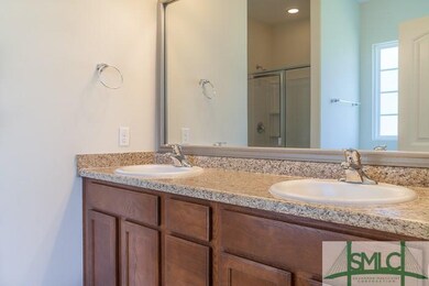 Large open owner's bath with double vanity sinks, 