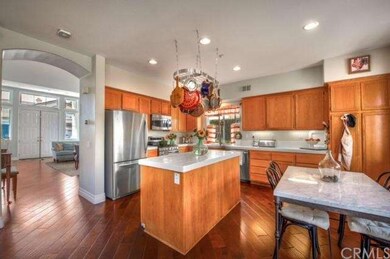 Kitchen. The  diagonal hardwood floor continues in