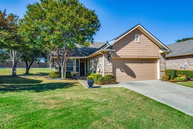 View of front of house featuring a front yard and 