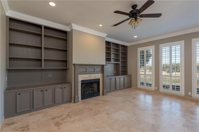 Unfurnished living room with built in features, re