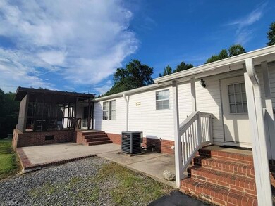 view from the back with a concrete landing