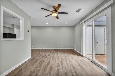 Unfurnished room featuring wood finished floors, 