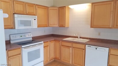 Bright Kitchen with wood cabinets