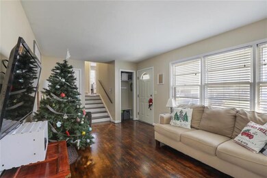 This beautiful living room welcomes you into the h