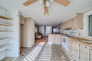 Kitchen with sink, light hardwood / wood-style flo