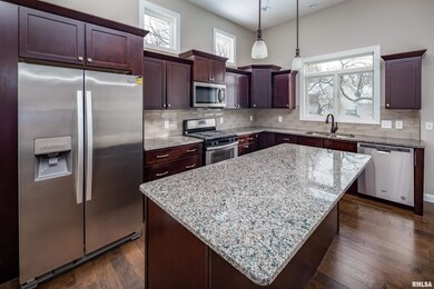 1623 Irish Woods Cir, Davenport, IA 52807 - photo 2