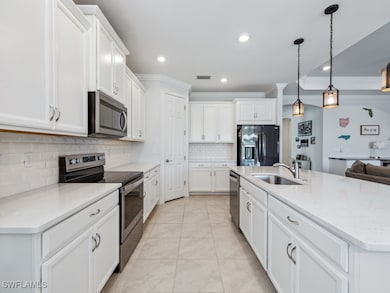 Kitchen featuring appliances with stainless steel