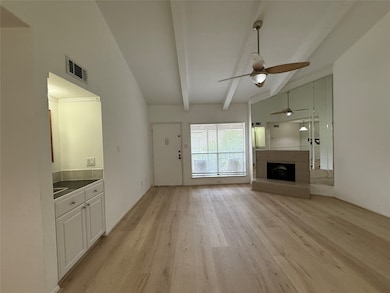 Living area and wet-bar.