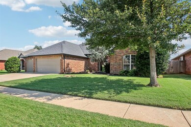 View of front of property with a garage and a fron