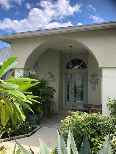 Covered entry with room for seating..