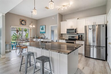 Renovated kitchen with Center island granite bar